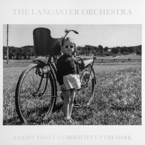 The Lancaster Orchestra - A Light That Can Brighten Up The Dark i gruppen Minishops / Ella Ruth Institutet hos Bengans Skivbutik AB (5569511)